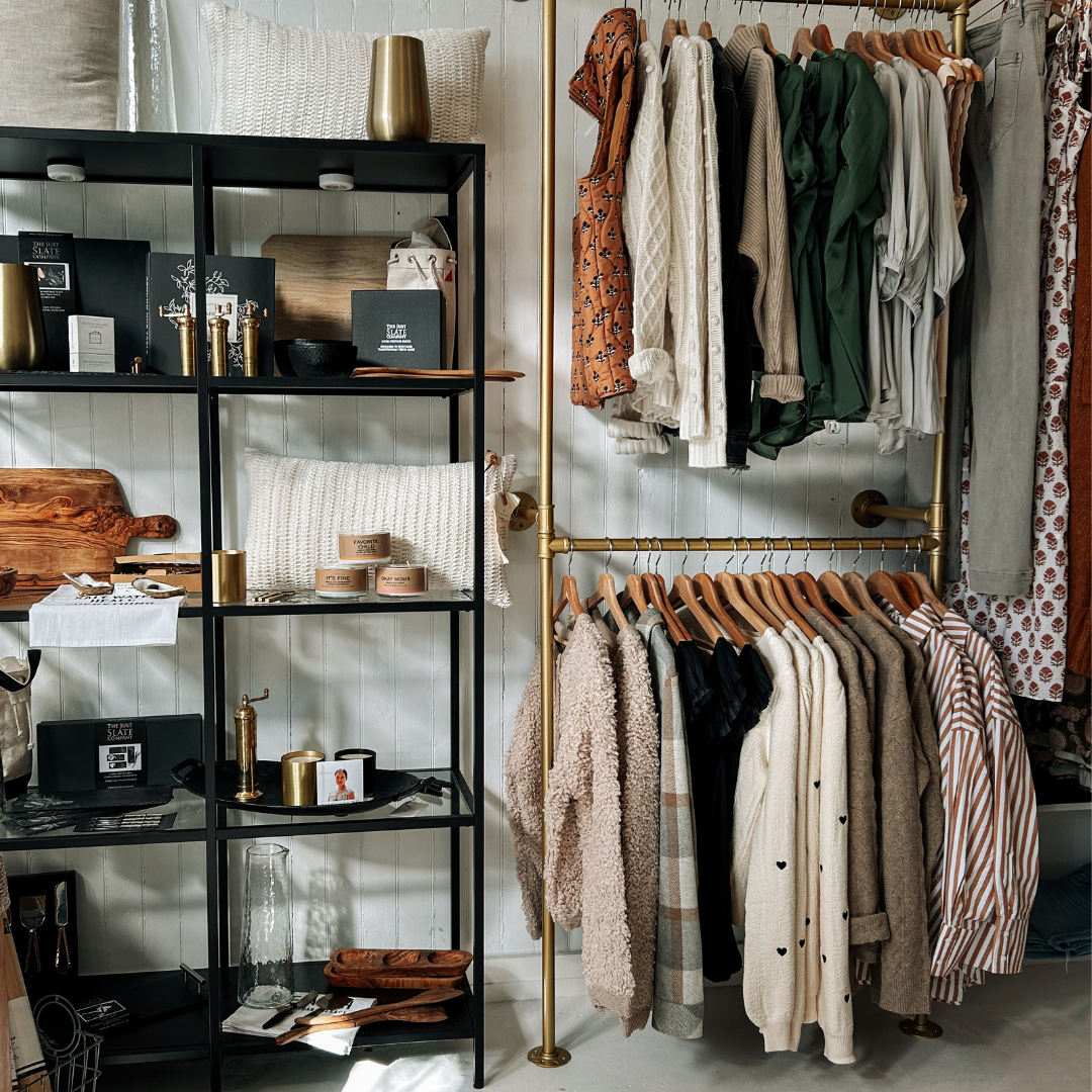 Home and women’s section at Grace & Haven featuring sustainable brands, including Gather Intentional Living candles supporting women’s economic growth in Thailand and handcrafted olivewood pieces from retired fruit-bearing trees.