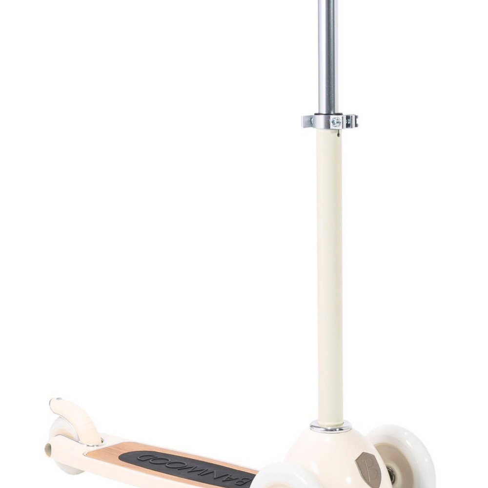 Full view of Banwood Cream Scooter, highlighting the stylish cream color, adjustable T-handlebar, and sleek design ideal for young riders.