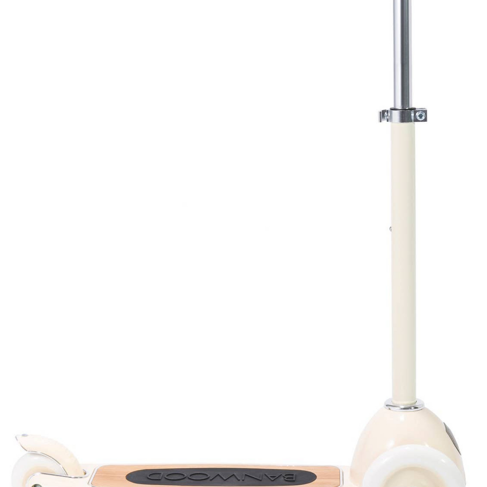 
                      
                        Side view of Banwood Cream Scooter without basket, showcasing the adjustable T-handlebar, wide deck with anti-slip tape, and Easy Ride Steering System.
                      
                    