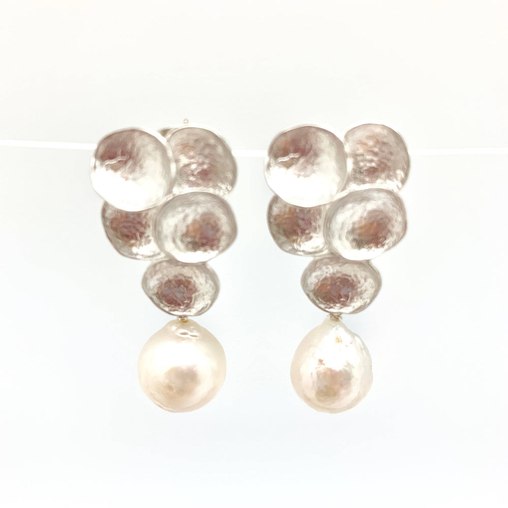 Beautifully crafted silver earrings with stunning Baroque pearls. 