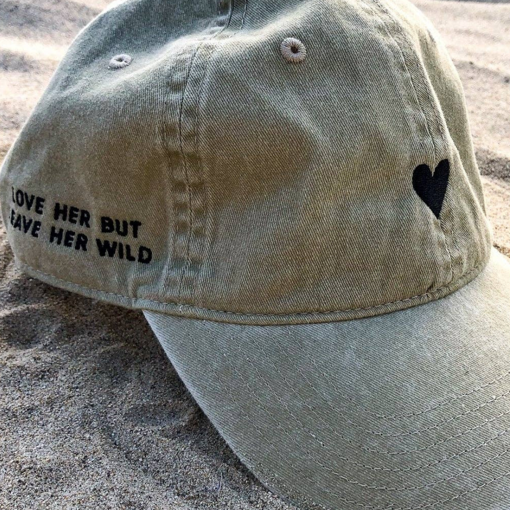 
                      
                        Side view of the Beige Heart Hat showcasing its elegant heart embroidery.
                      
                    