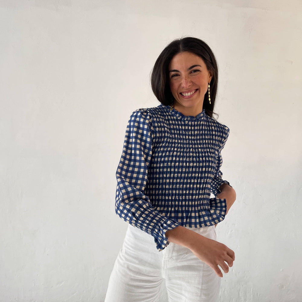 Chía Blue Blouse with honeycomb detailing and ruffles, designed in Barcelona.