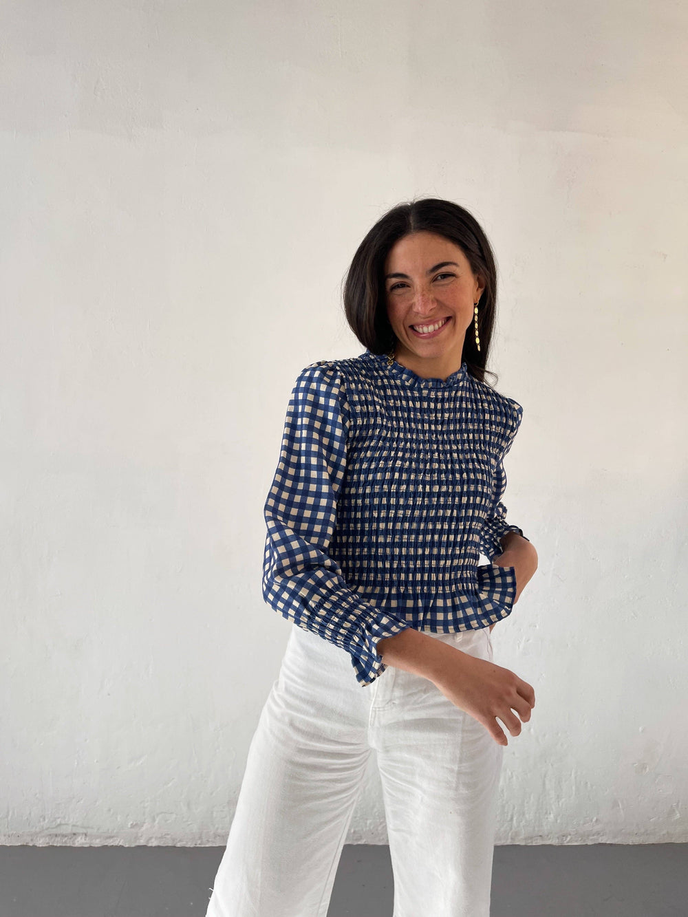 Chía Blue Blouse with honeycomb detailing and ruffles, designed in Barcelona.