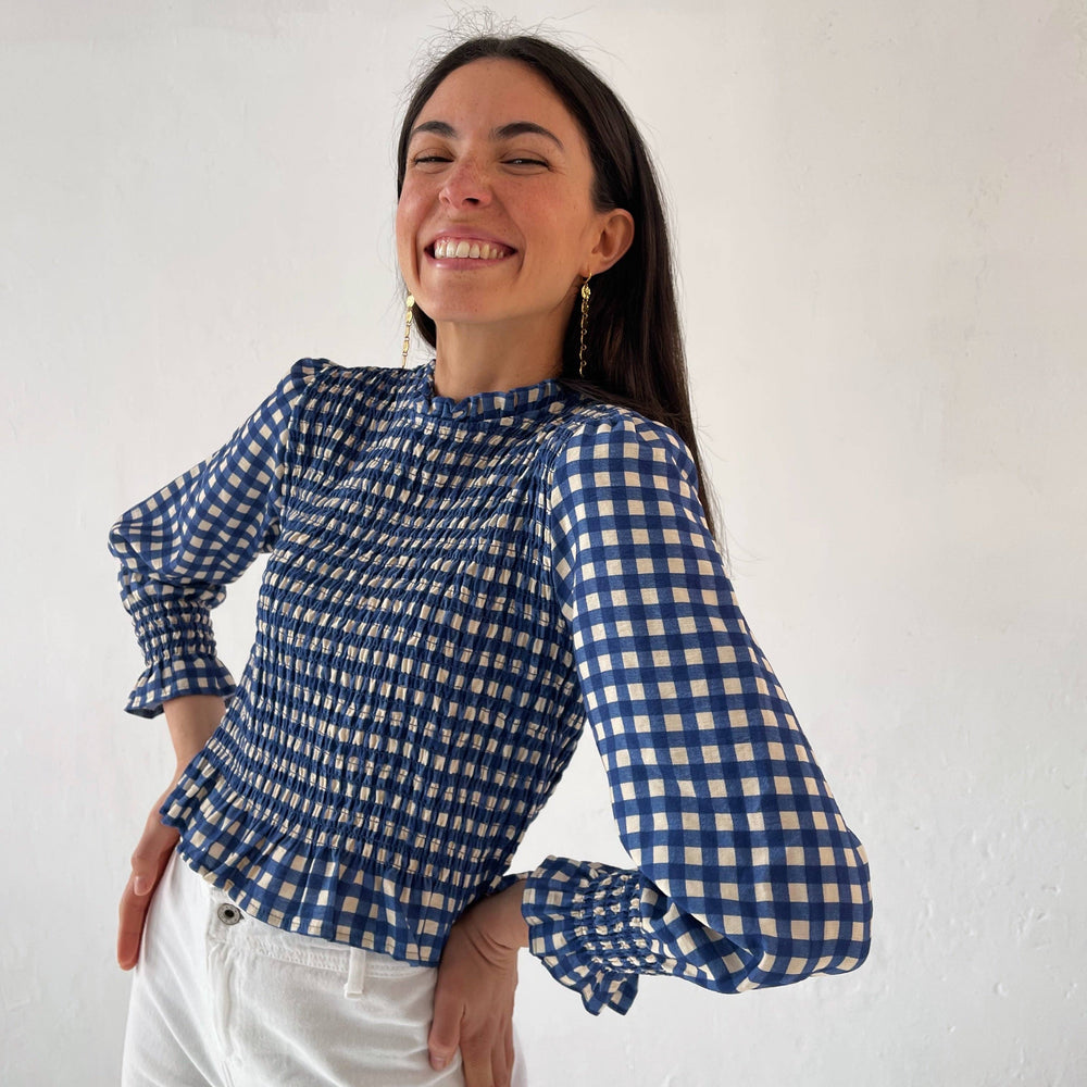 
                      
                        The Chía Blue Blouse is a sophisticated blend of elegance and comfort, perfect for elevating your wardrobe.
                      
                    