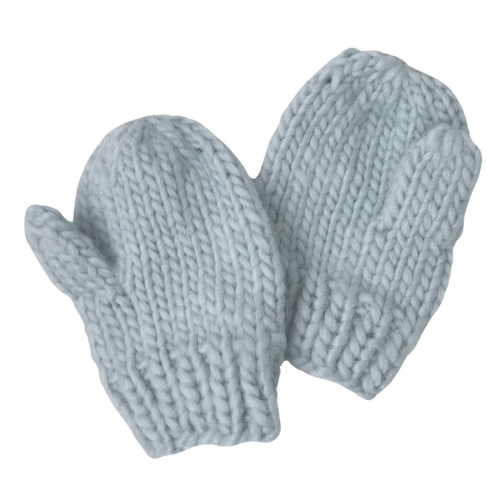 Stay warm and stylish with the Classic Mittens in Bowie Grey by The Blueberry Hill. Hand-knit from 100% acrylic, these sweet mittens provide cozy comfort for little hands.