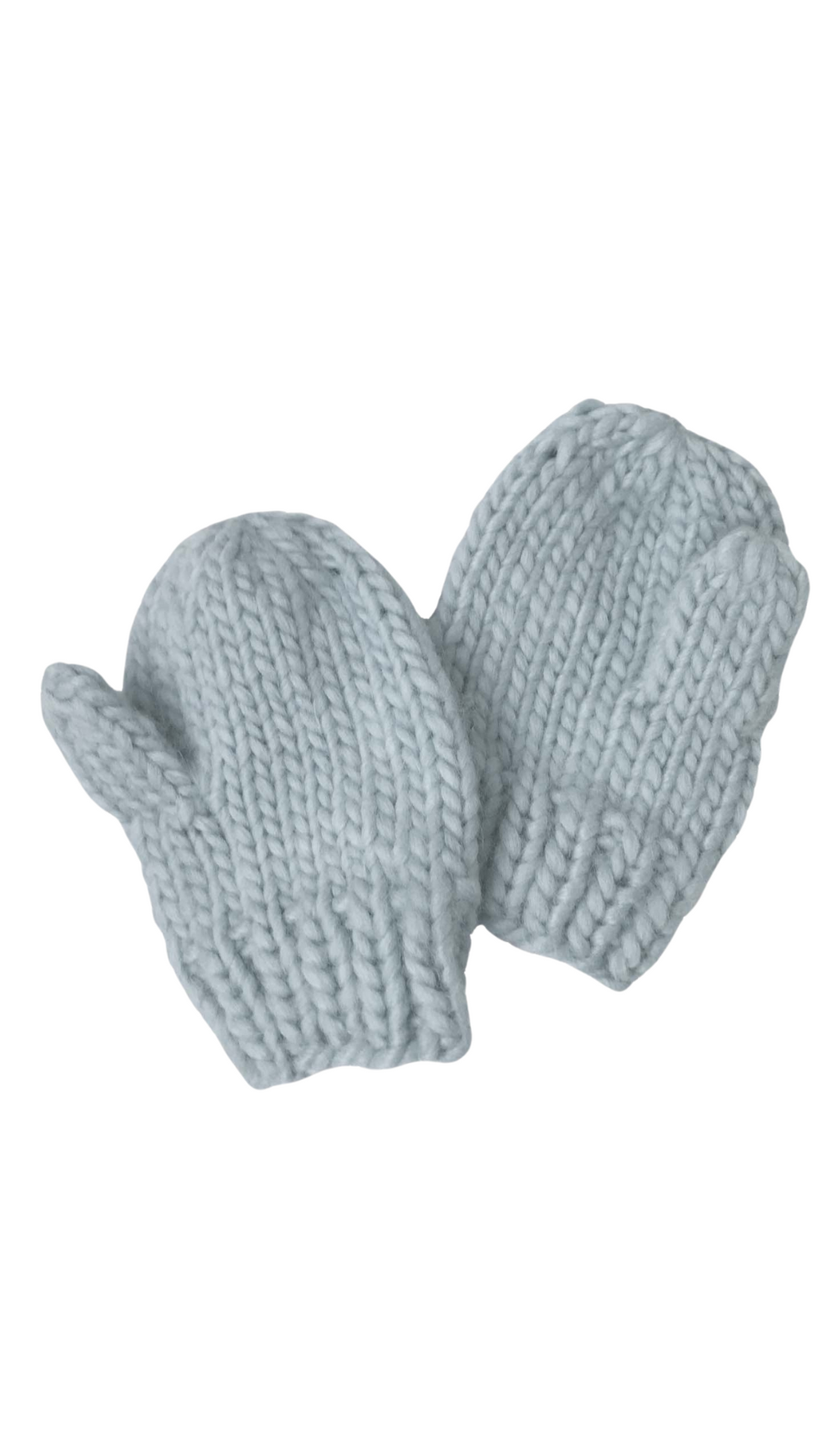 Stay warm and stylish with the Classic Mittens in Bowie Grey by The Blueberry Hill. Hand-knit from 100% acrylic, these sweet mittens provide cozy comfort for little hands.