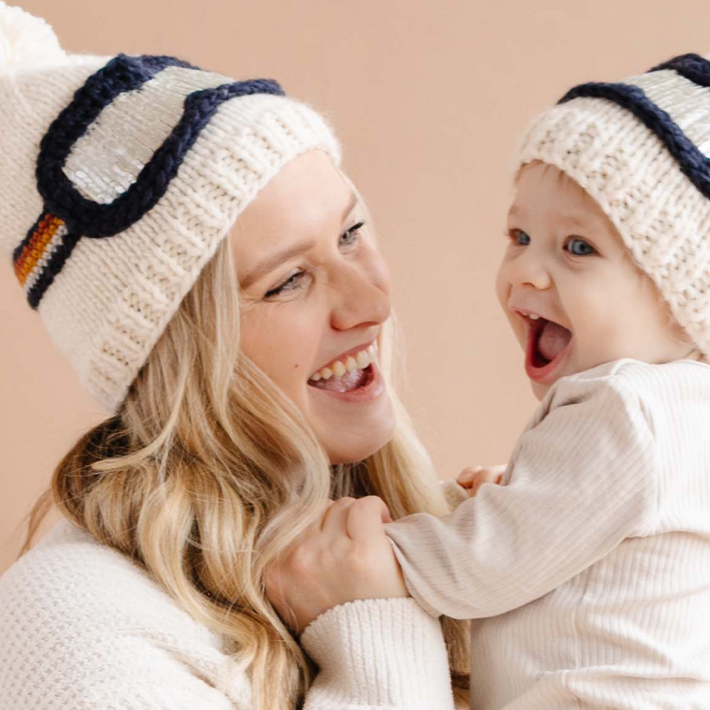 
                      
                        Mom and Child wearing matching Ski Goggles Hats pair with coordinating cardigans or fleece, highlighting versatile pairings for a stylish winter look.
                      
                    