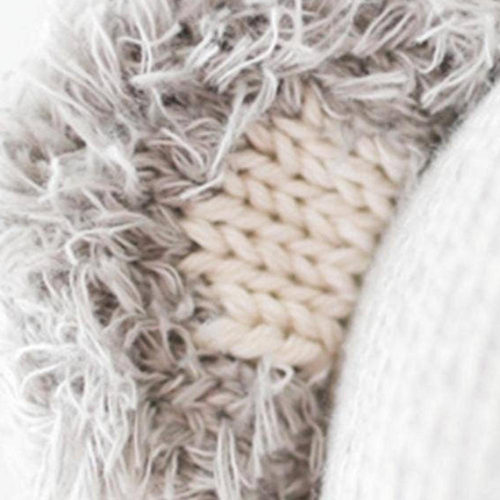 
                      
                        Close-up of Quinn the Koala's adorable koala ear, highlighting premium knit details and soft texture for the ultimate cuddle experience.
                      
                    