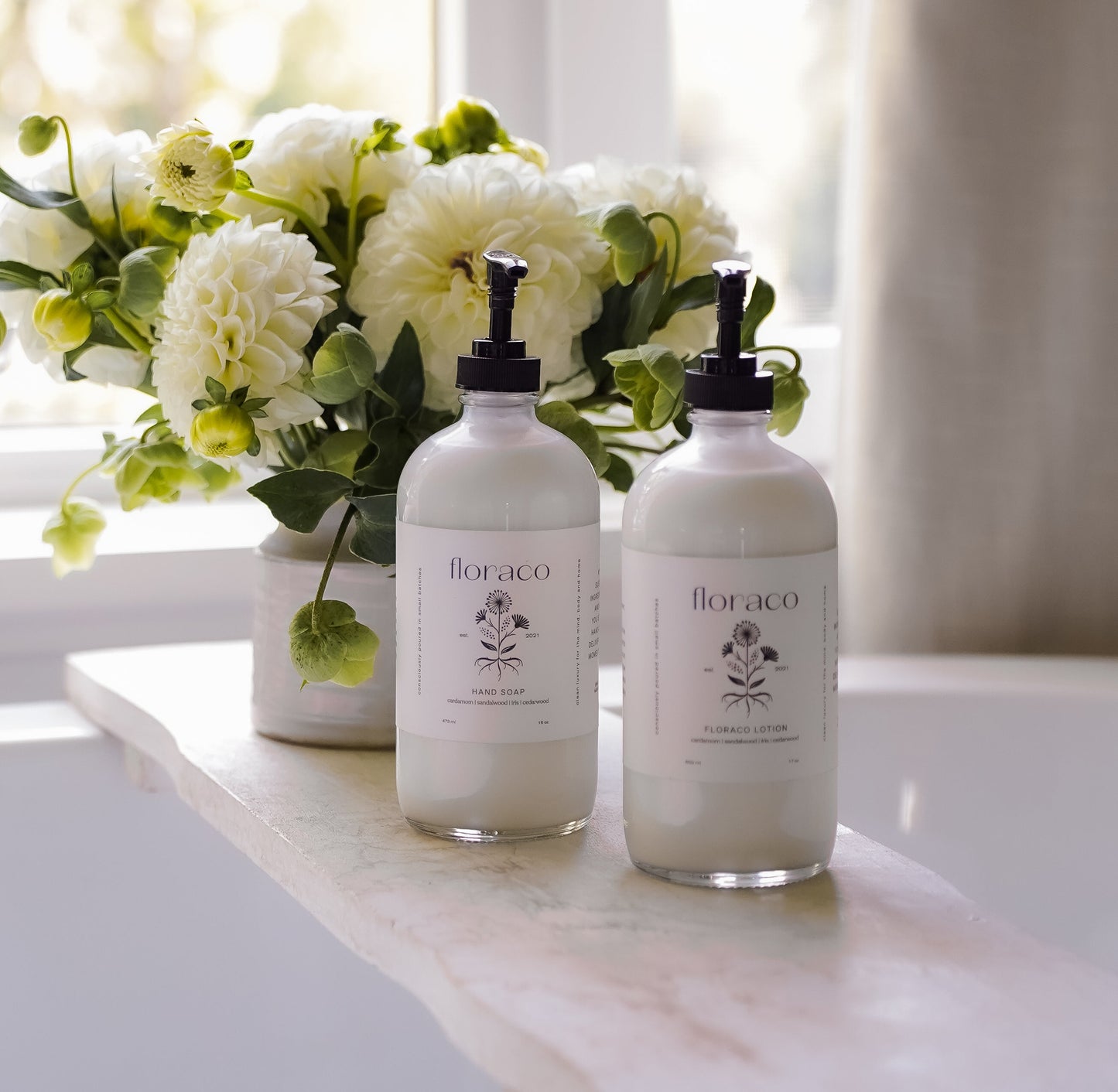 Floraco Hand + Body Lotion: Cedarwood, Sandalwood, Iris and Cardamom