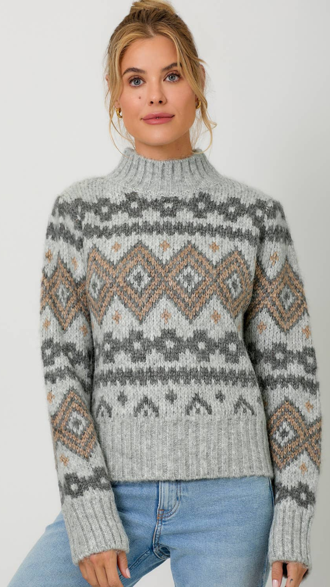 Close-up of the Fair Isle Mock Neck Sweater’s luxurious lurex detailing, capturing the shimmer and texture