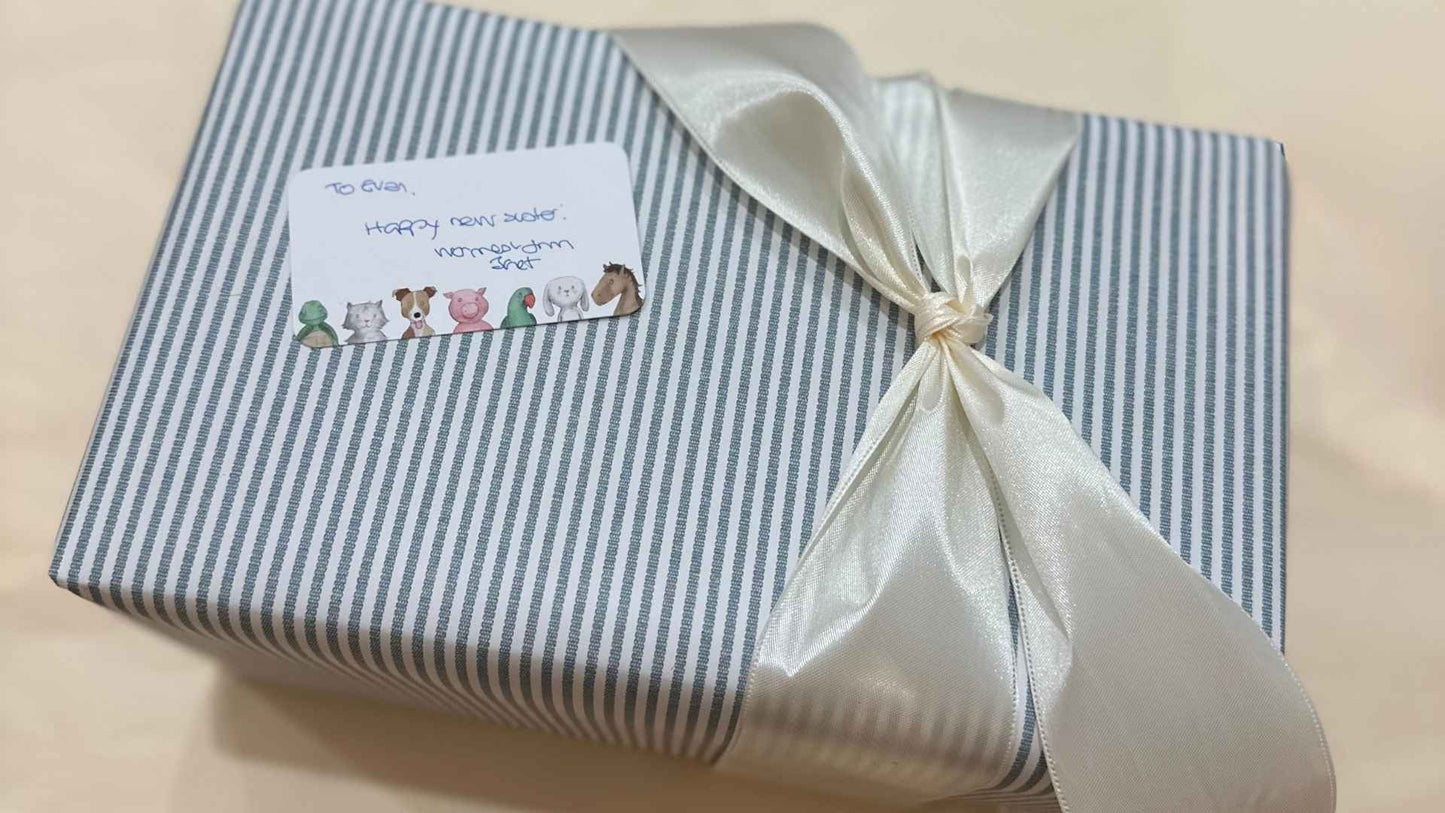 Beautifully wrapped baby gift at Grace & Haven in Essex, CT