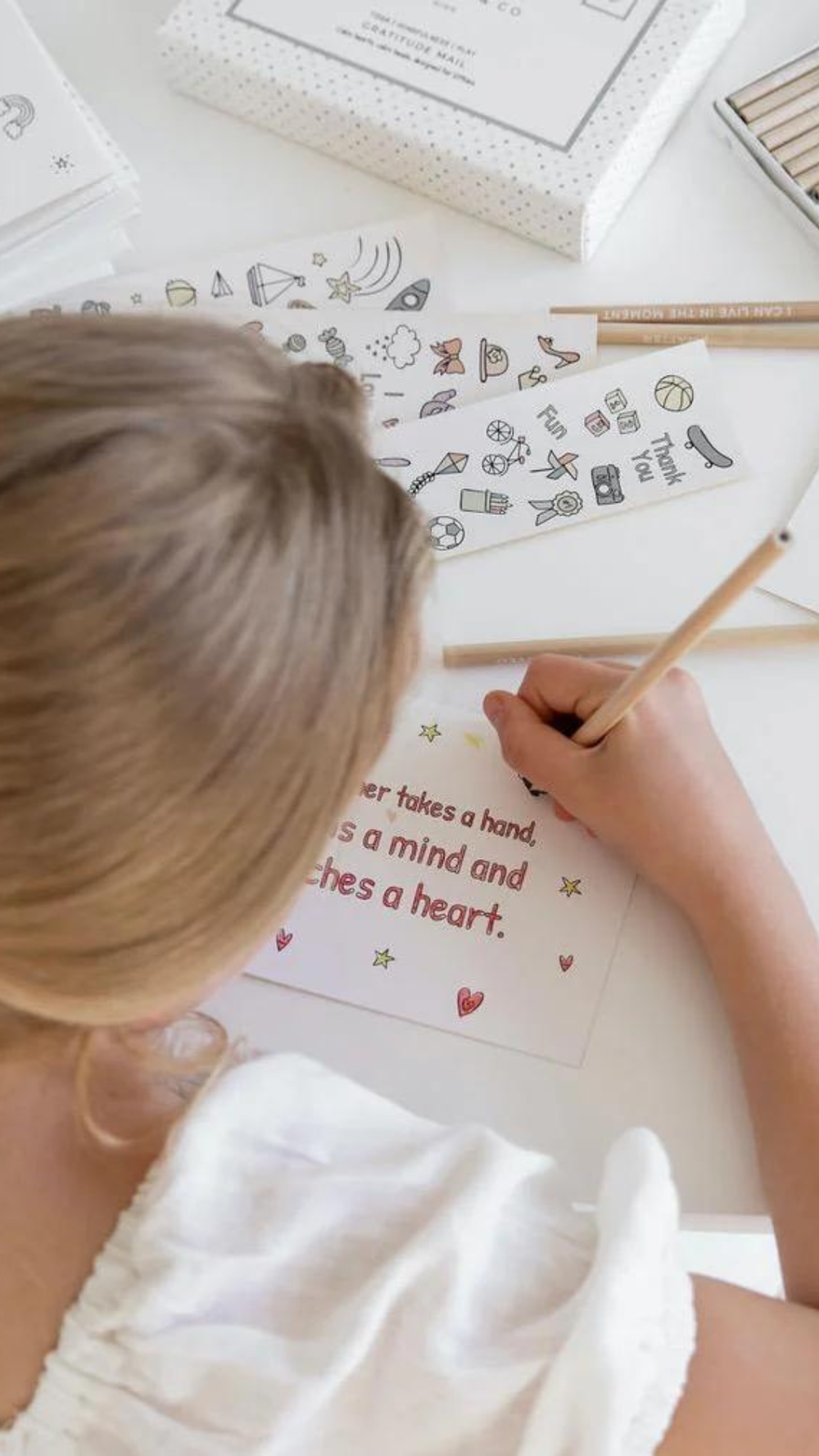 Close-up of beautifully illustrated gratitude cards for kids