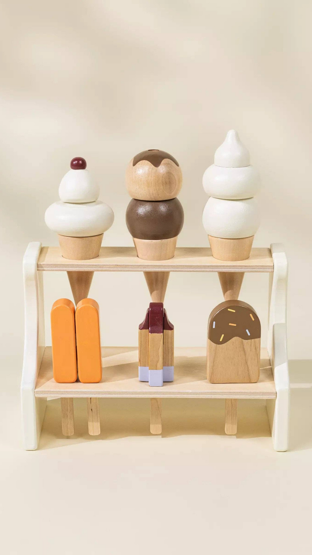 Front view of Wooden Ice Cream Stand playset, featuring a whimsical dessert shop design with ice cream cones, ice pops, and a spoon for creative pretend play and motor skill development.