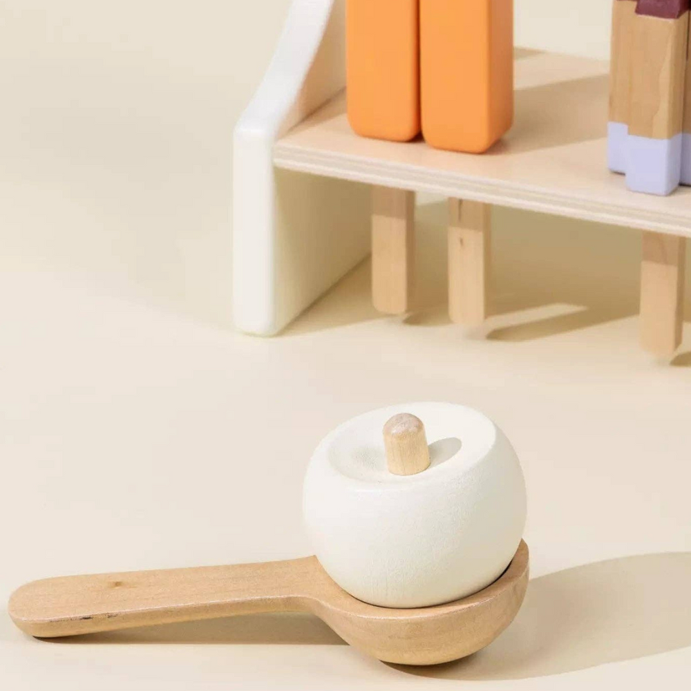 
                      
                        Close-up of creamsicle ice pop and wooden ice cream scoop with a scoop of vanilla ice cream, part of the Wooden Ice Cream Stand playset designed for pretend dessert-making fun and motor skill enhancement.
                      
                    