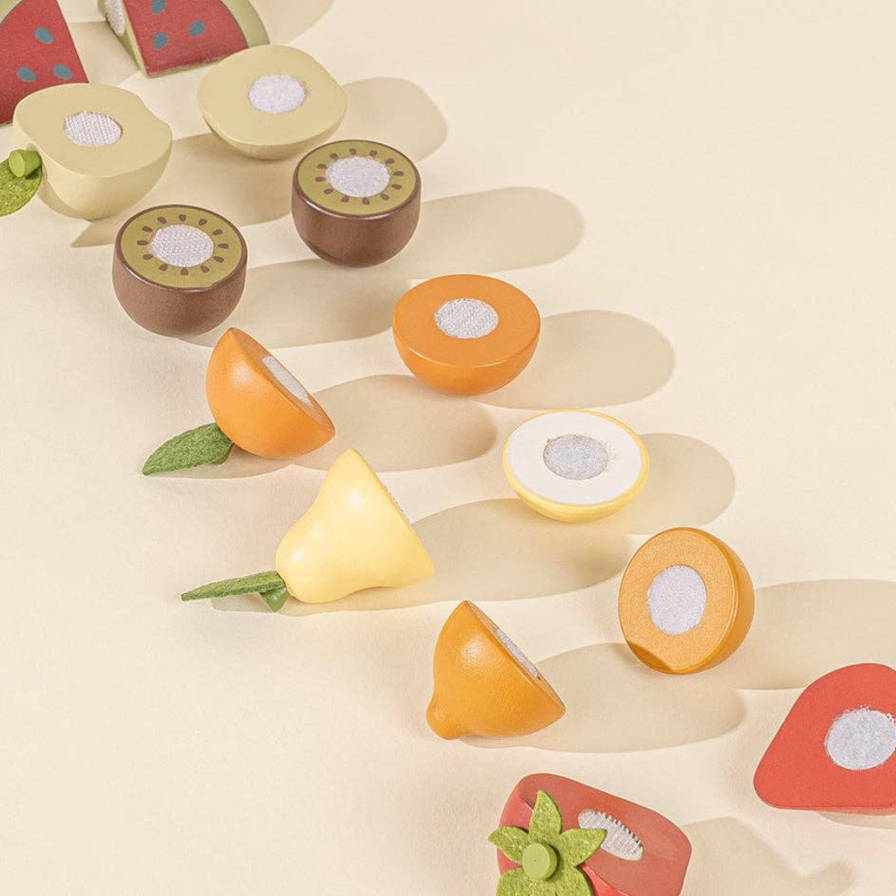 
                      
                        Wooden fruit displayed in two halves to demonstrate how the fruit can be sliced using the included wooden knife, part of the Wooden Fruits Playset for pretend market and kitchen play.
                      
                    