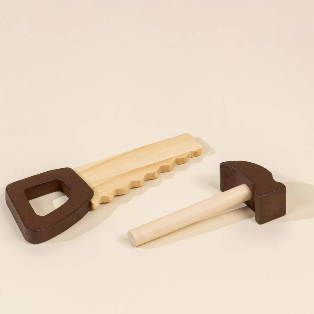 
                      
                        Close-up of hammer and saw from the Wooden Tool Playset, made from high-quality pinewood, designed to inspire children’s creativity and manual skills through safe, hands-on play.
                      
                    