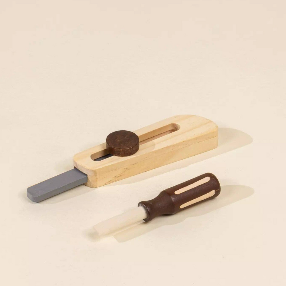 
                      
                        Close-up of screwdriver and box cutter from the Wooden Tool Playset, crafted from eco-friendly pinewood, designed to encourage children’s creativity and manual skill development.
                      
                    