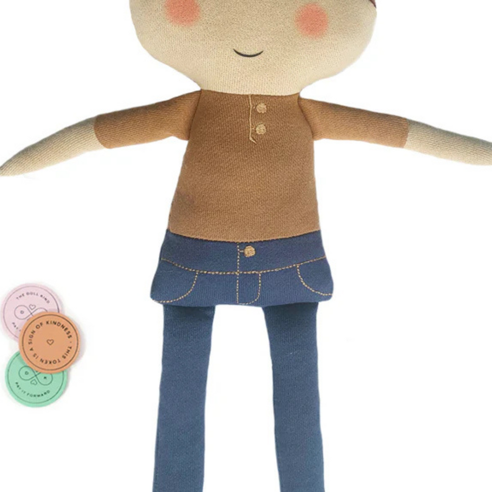 Hope Kindness Doll with 10 colorful kindness tokens arranged in a flat lay, promoting acts of kindness and positivity.