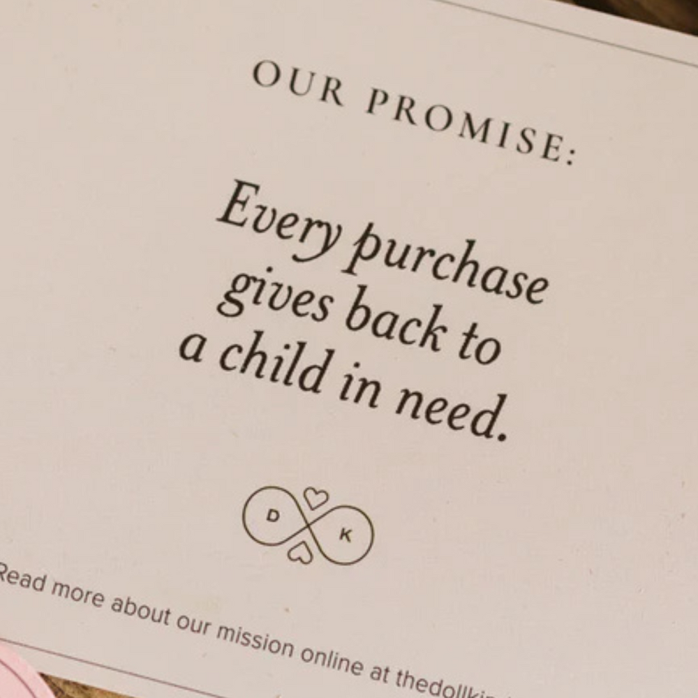 
                      
                        Hope Kindness Doll purchase note showing that a portion of proceeds supports children in need, promoting generosity and giving back.
                      
                    