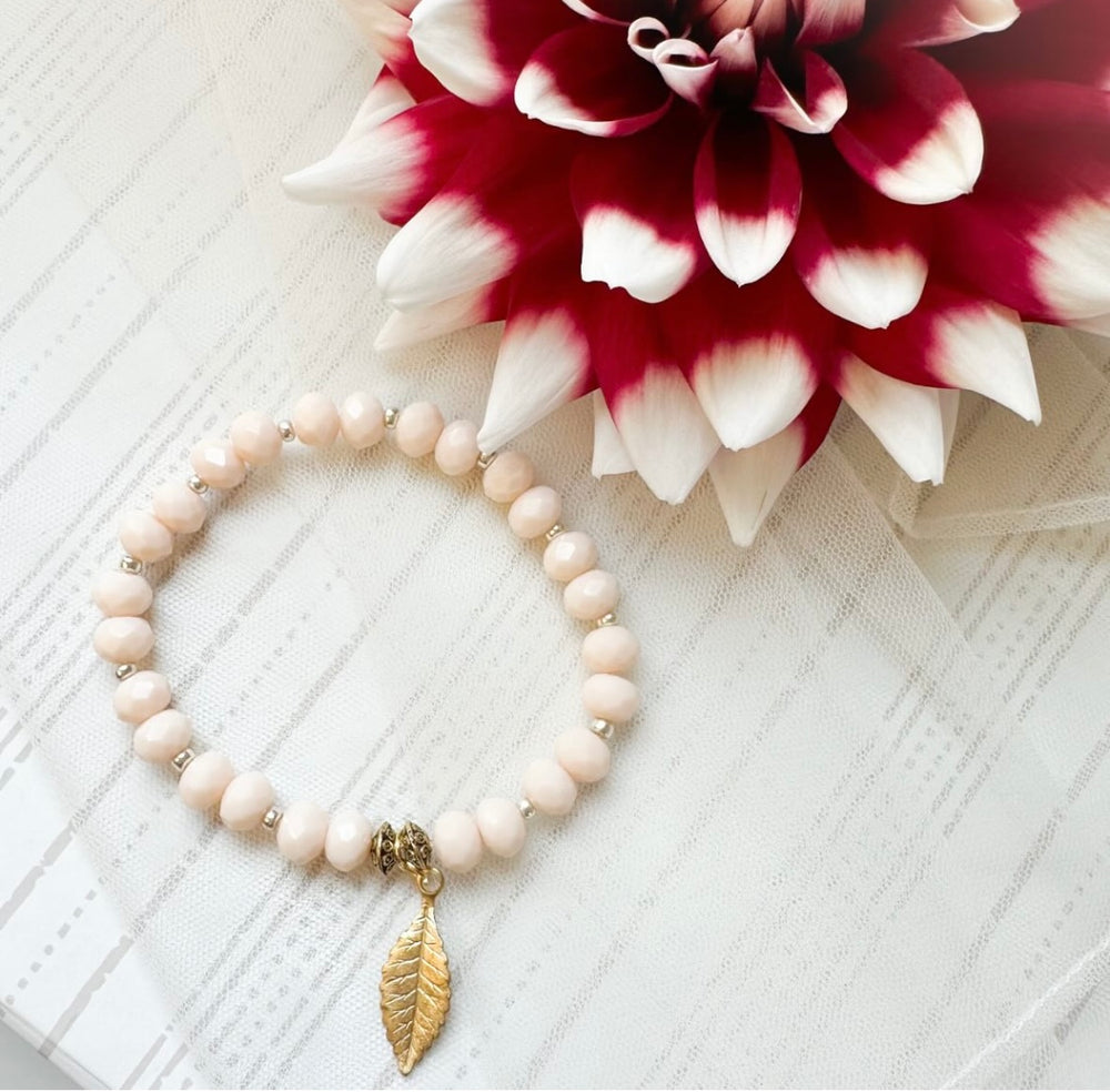 Ivory Elegance - Milk Glass Bracelet with Brass Leaf Charm