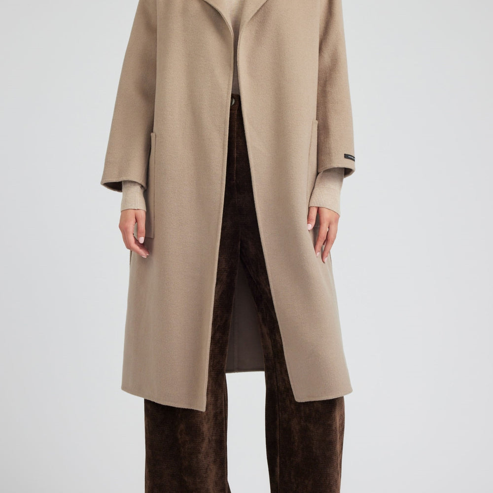 
                      
                        Front view of Lapel-Collar Oversized Wool Coat in chic latte hue, featuring a trendy oversized silhouette and sophisticated lapel collar
                      
                    