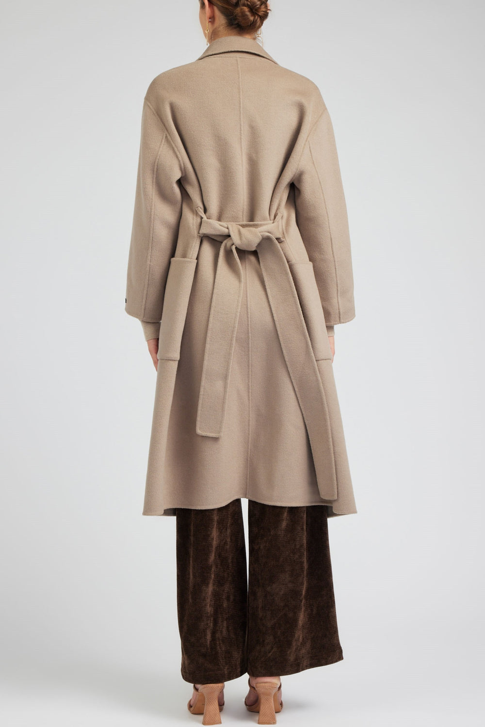 Back view of Lapel-Collar Oversized Wool Coat in latte, showcasing its relaxed fit and cozy wool fabric for versatile outerwear styling