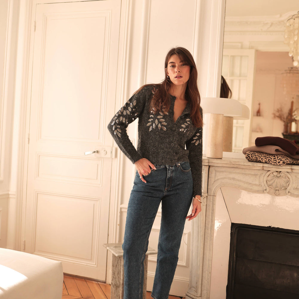 
                      
                        Soft knit sweater by Laura Laval Paris, featuring silver sequins for a touch of glamour."
                      
                    