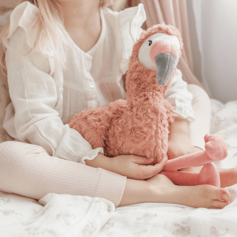 
                      
                        A sweet little girl holding Francesca The Weighted Flamingo, a comforting and calming toy designed to help children feel secure and relaxed. Perfect for snuggling and soothing, this adorable flamingo provides comfort in a fun and engaging way.
                      
                    