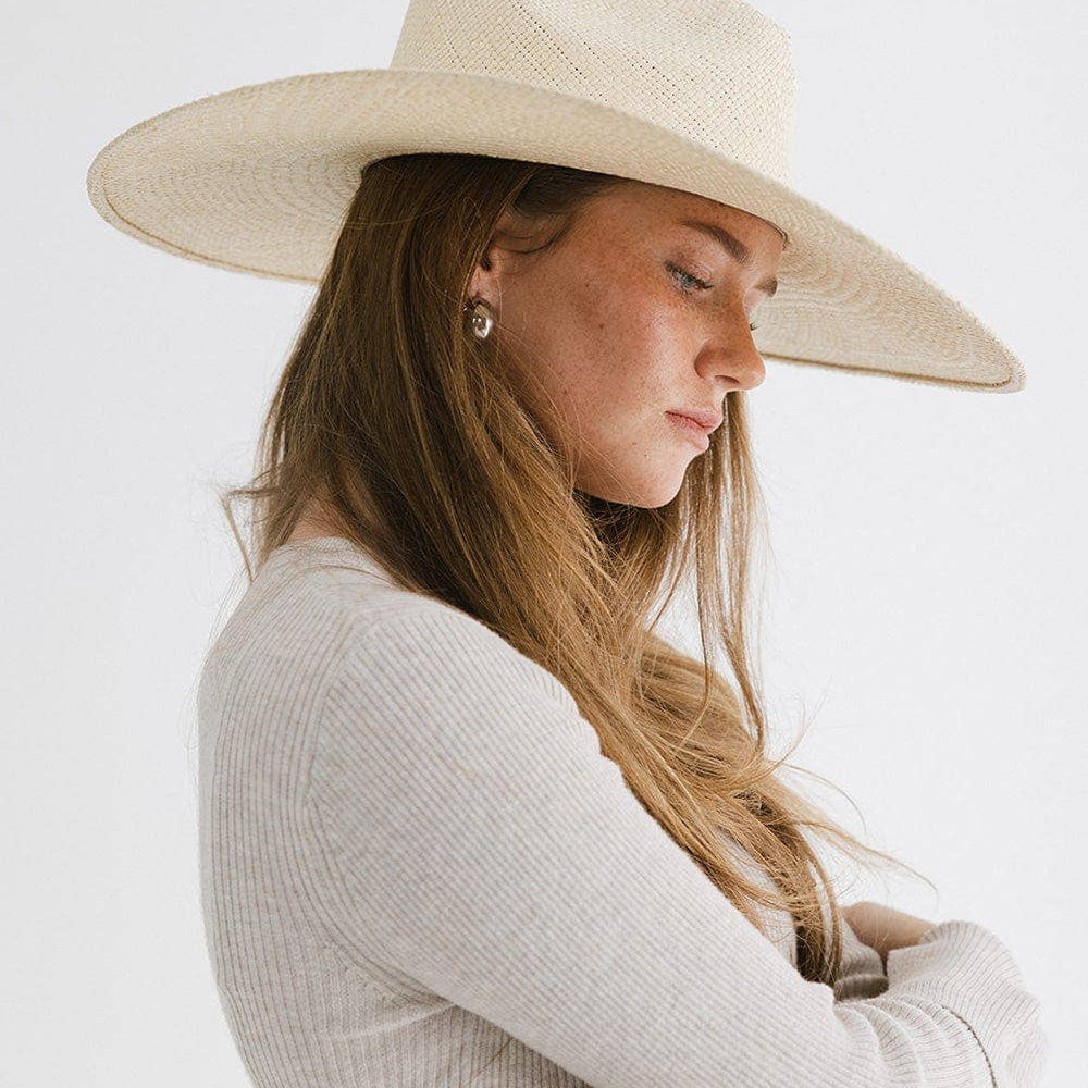 
                      
                        Side view of Meg Wide Brim Fedora highlighting the lightweight and breathable design, perfect for summer outings and transitioning to fall
                      
                    