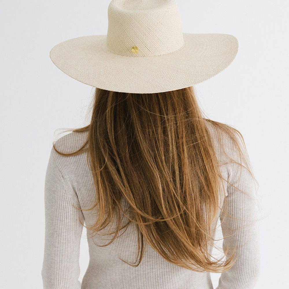 
                      
                        Back view of Meg Wide Brim Fedora, illustrating the intricately woven straw craftsmanship ideal for layering with fall outfits
                      
                    