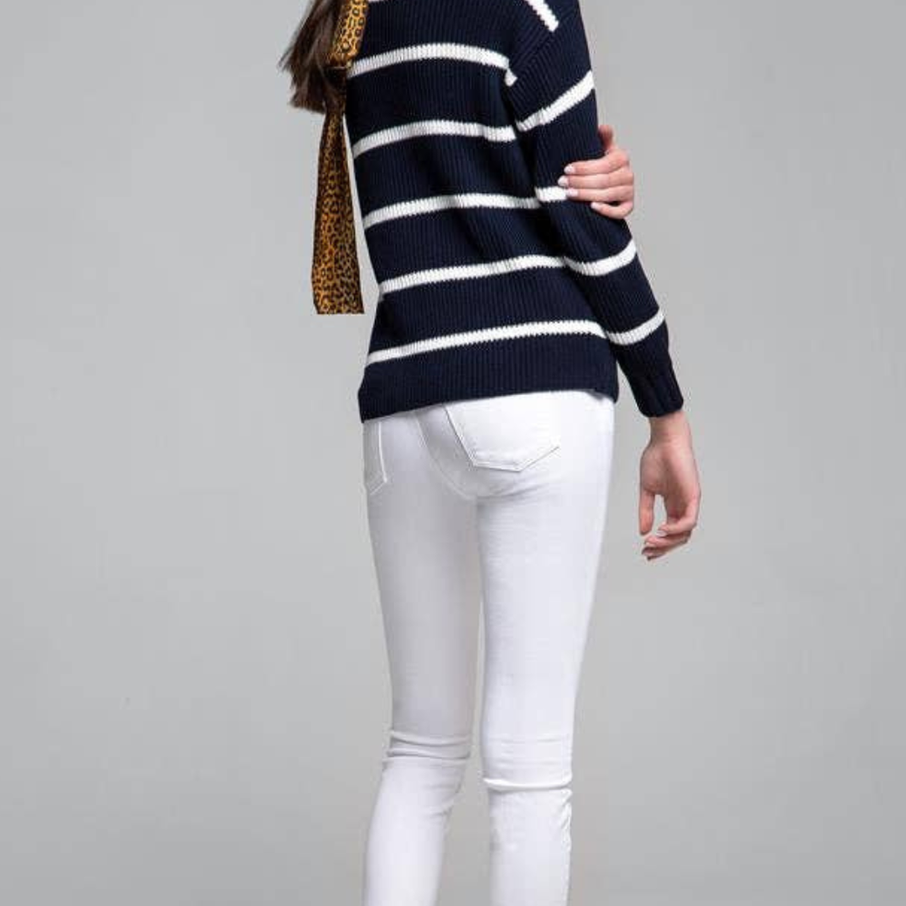 
                      
                        Monaco Sweater styled with white trousers and sandals for a chic, relaxed look
                      
                    