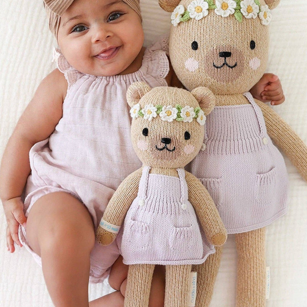 
                      
                        Hand-knit Olivia the Honey Bear plush, providing meals to children in need and empowering communities.
                      
                    