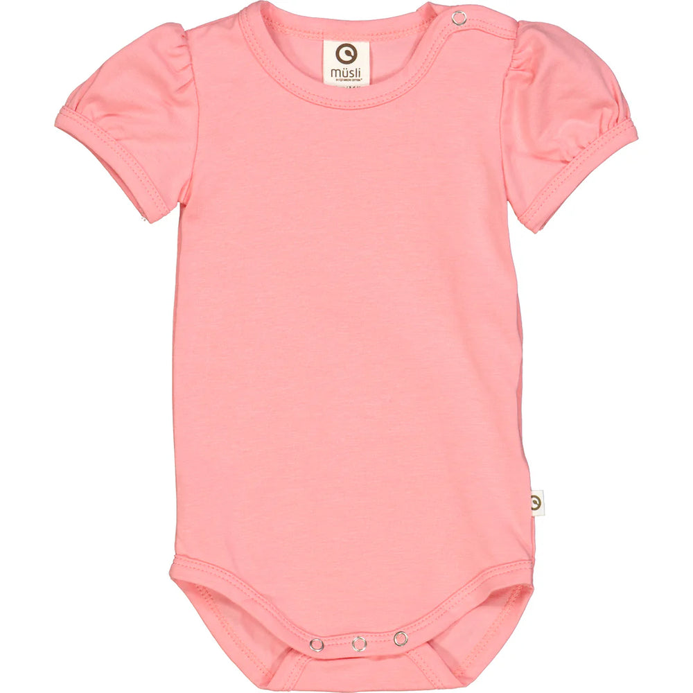 Front view of the Puff Sleeve Onesie in pink, made from soft organic cotton with short puff sleeves and press-button openings.