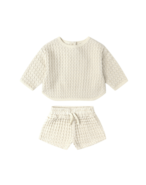 Flatlay of Quincy Mae Flynn Set in Natural, featuring waffle knit long sleeve top and matching shorts.