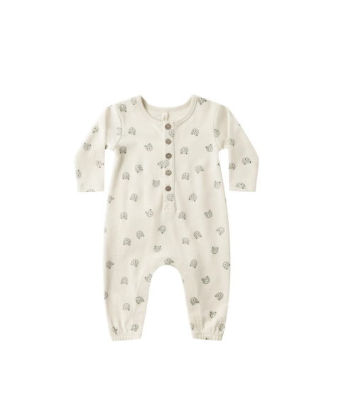 Flatlay of Quincy Mae Long Sleeve Jumpsuit in Bears print with coconut button front.