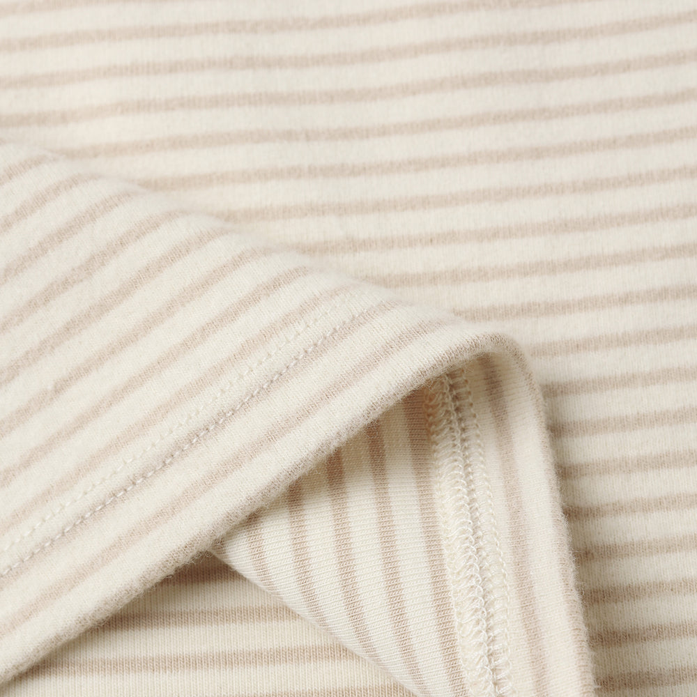 Close-up of Quincy Mae Long Sleeve Tee showing soft organic cotton fabric and oat micro stripe texture.