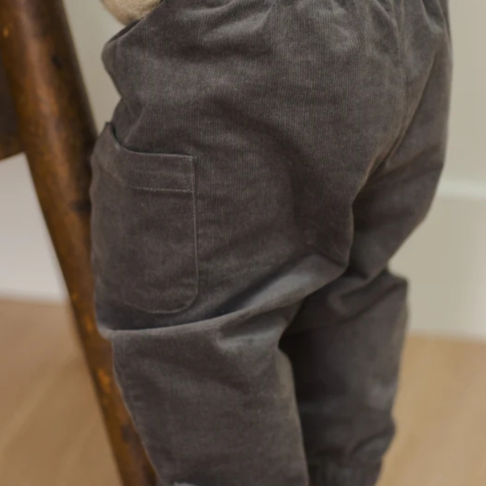 Close-up of the Luca Pant showing the soft corduroy texture and side pockets.