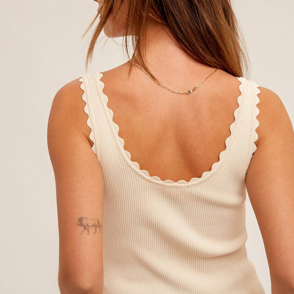 
                      
                        Cream tank top with delicate scalloped edges, shown in natural light
                      
                    