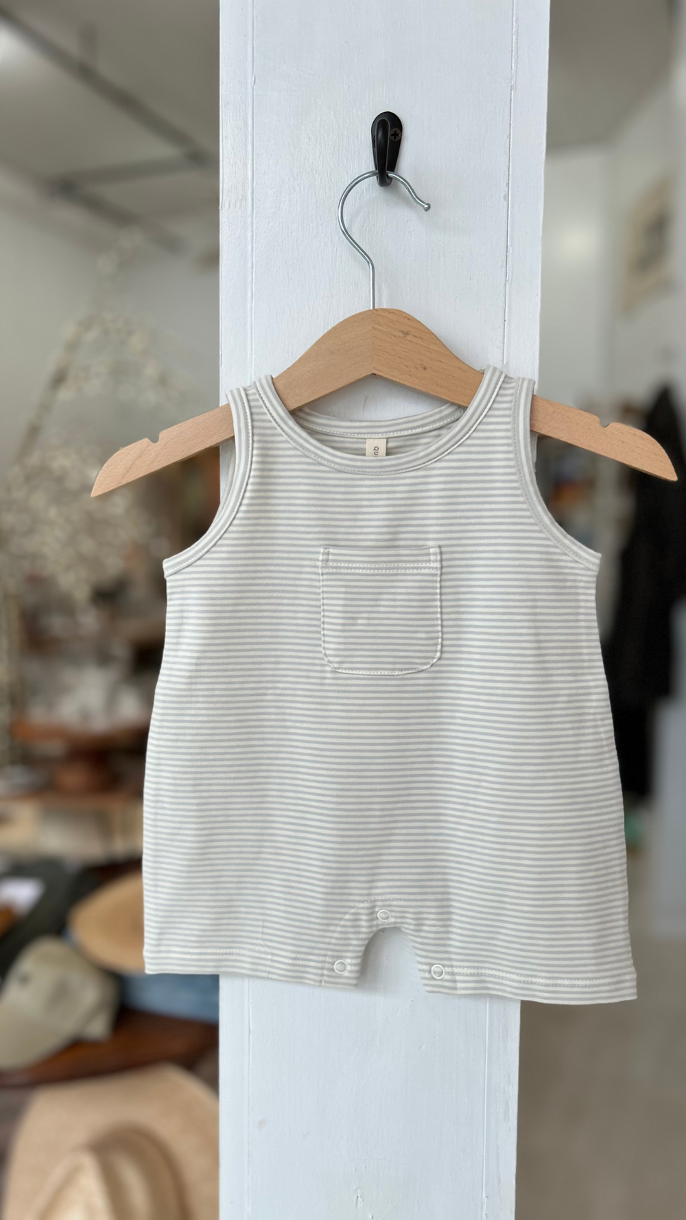 Let your little one stay cool and comfy in the Sleeveless Romper - Sky Stripe by Rylee + Cru. 