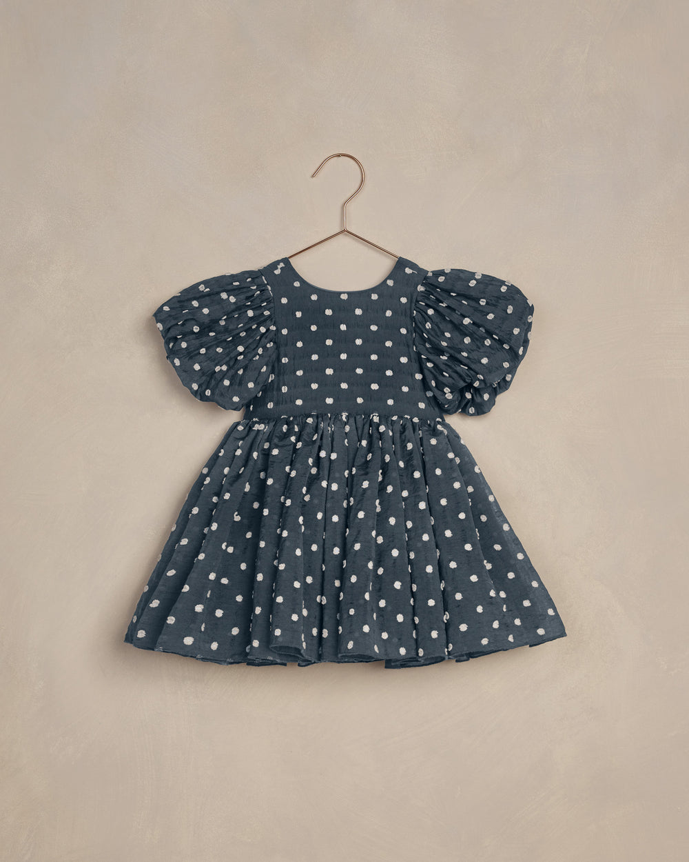 Sophia Dress by Noralee featuring a charming polka dot pattern, perfect for special occasions.