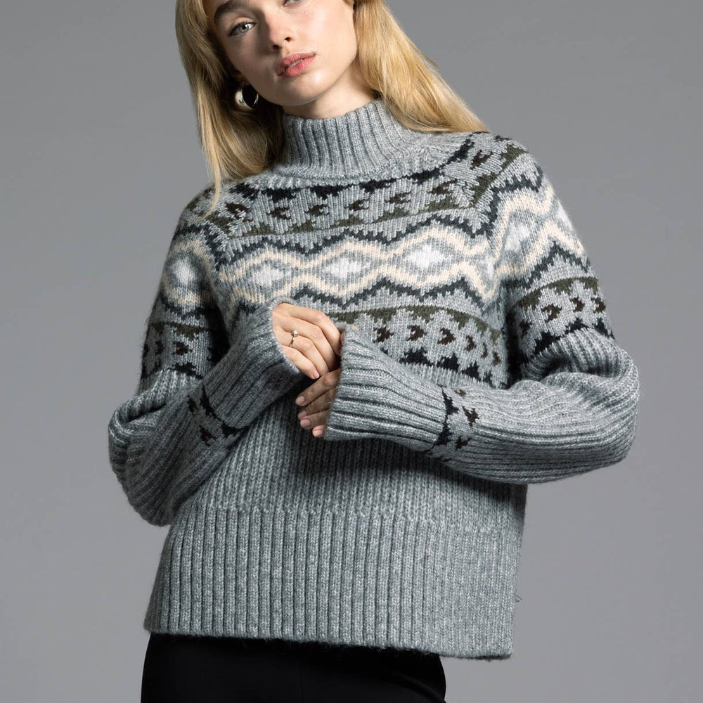 Elegant mock neck and subtle grey Aztec pattern for a contemporary yet classic look.