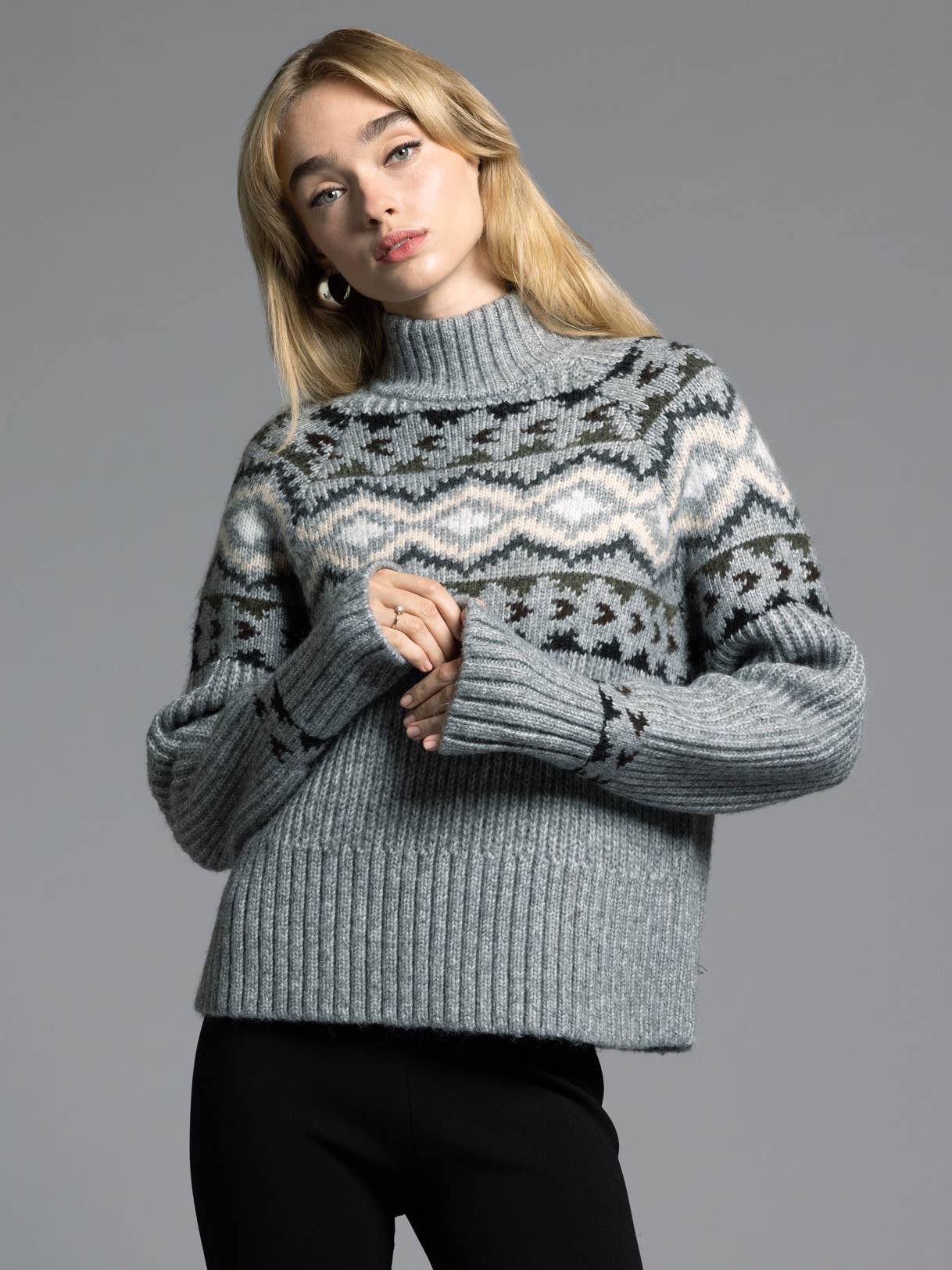 Elegant mock neck and subtle grey Aztec pattern for a contemporary yet classic look.