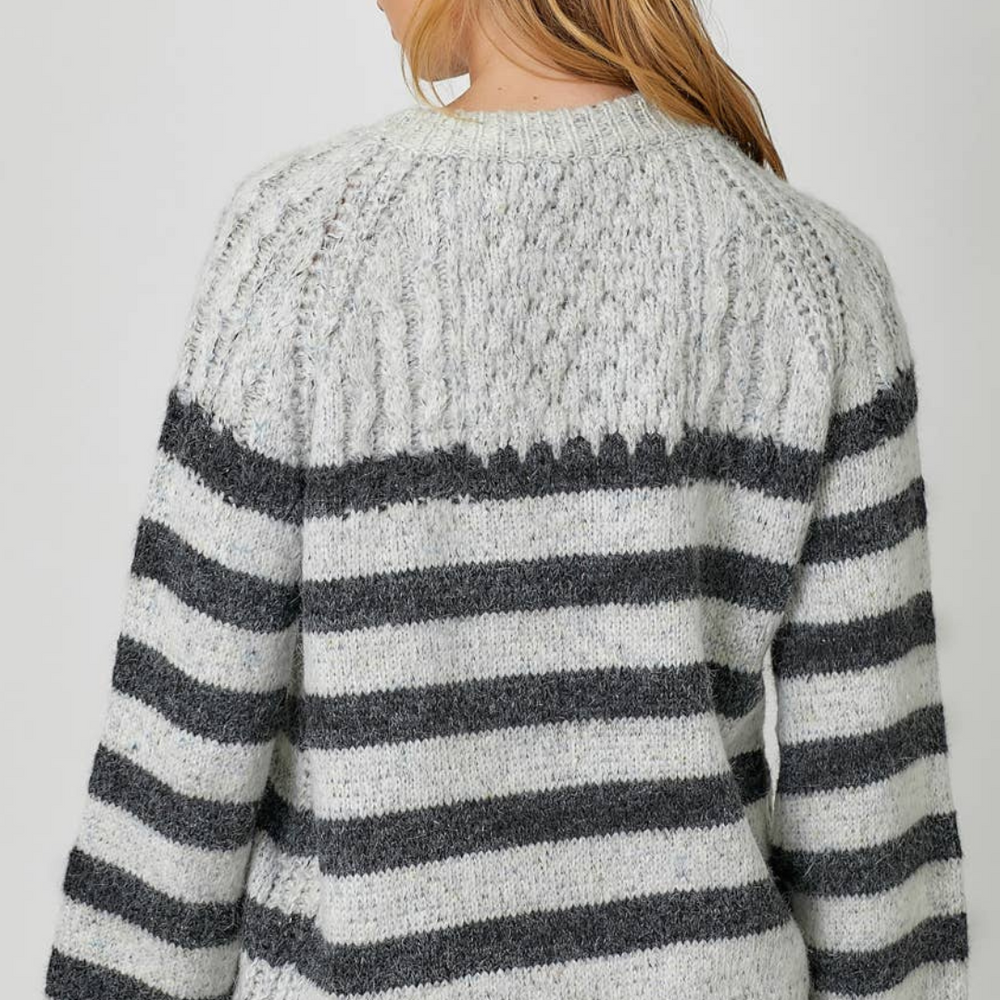 
                      
                        Back view of the Stripe Pullover Sweater, highlighting the relaxed fit and comfortable bubble sleeves.
                      
                    