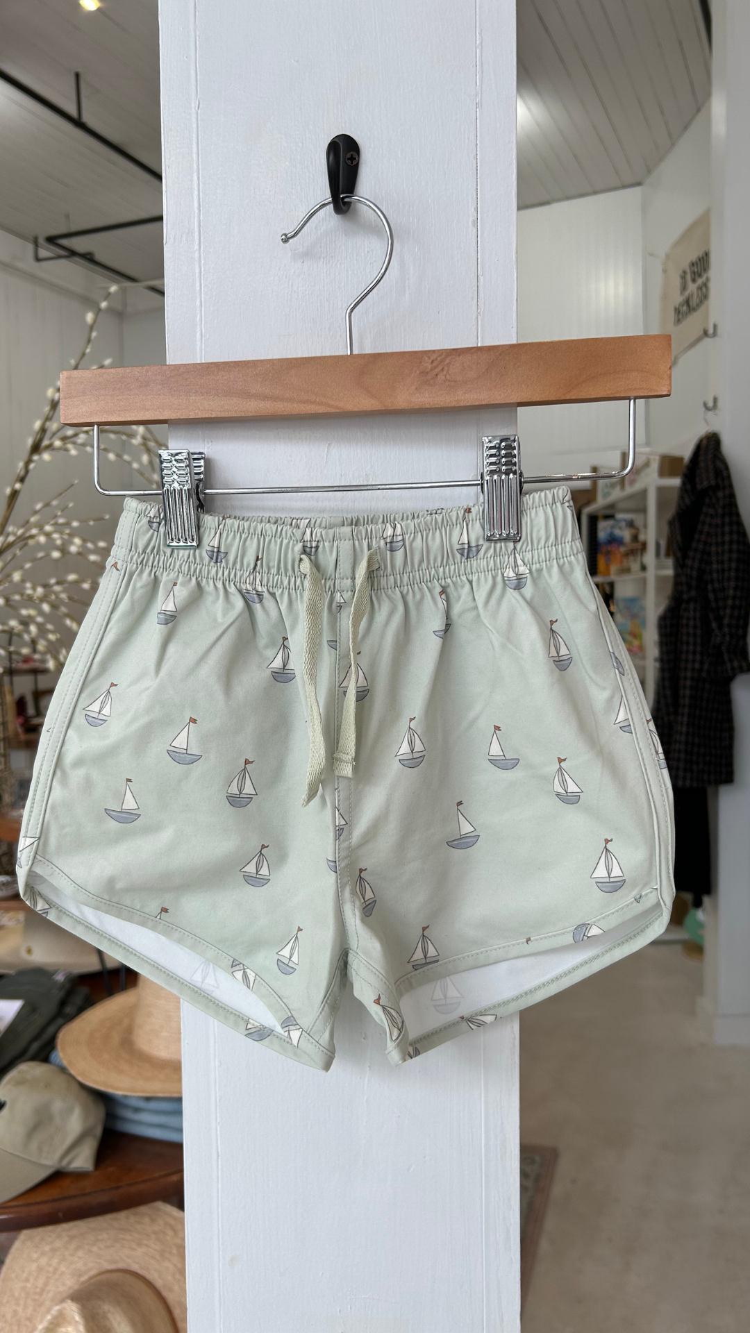 Set sail for summer fun with the Rylee + Cru Boys' Swim Shorts in Sailboats! 