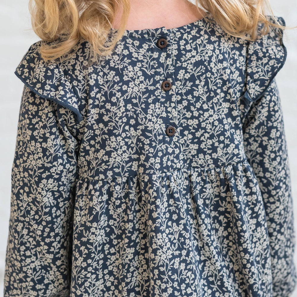 
                      
                        Mika Ruffle Long Sleeve Dress - Chicory Floral / Navy
                      
                    