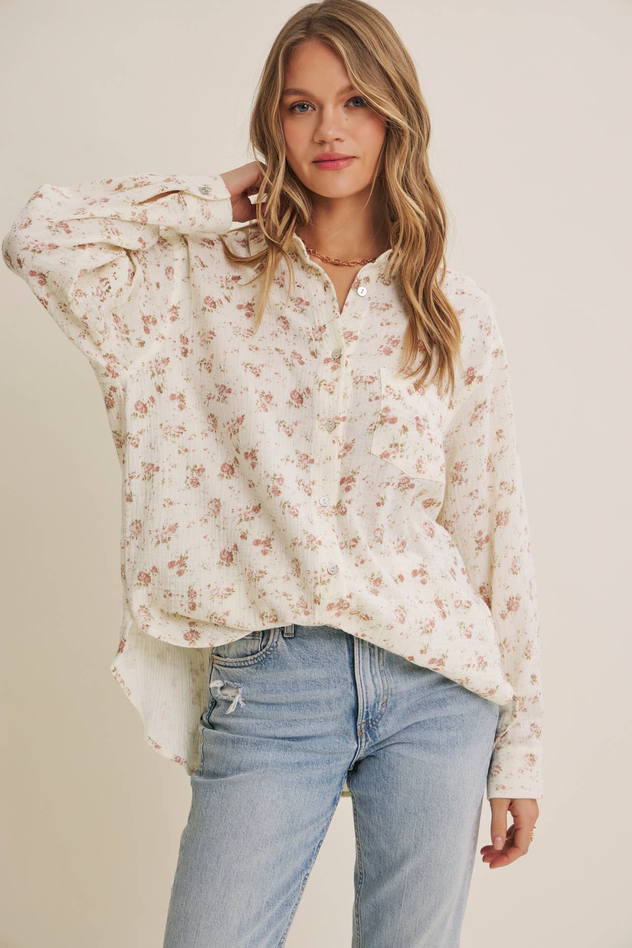 Soft Breeze Floral Cotton Gauze Relaxed Fit Shirt worn by a woman with blonde hair, featuring a light floral pattern