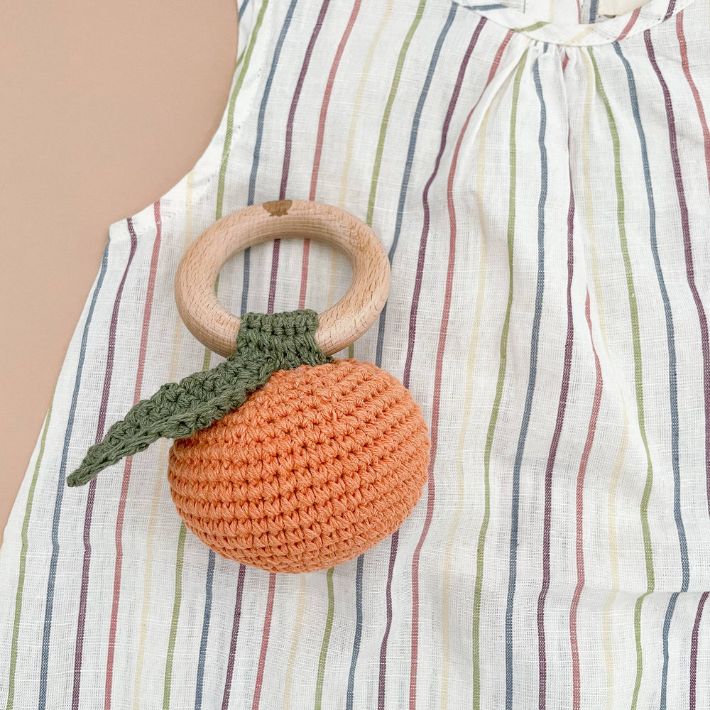 
                      
                        Cotton Crochet Rattle Fruit Orange Baby Teether – Clementine by The Blueberry Hill
                      
                    