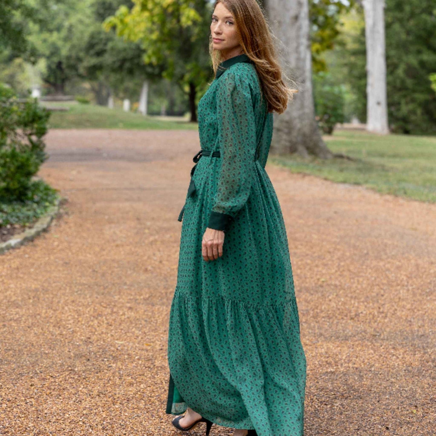 Model walking in Ashton maxi dress in green floral print