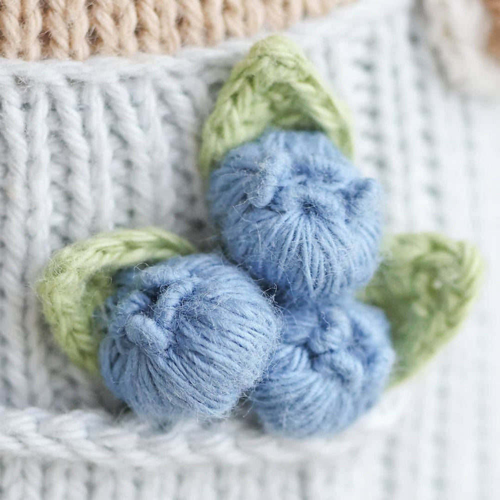 
                      
                        Asher the Cow by cuddle+kind – Hand-Knit Fair Trade Doll That Gives 10 Meals
                      
                    