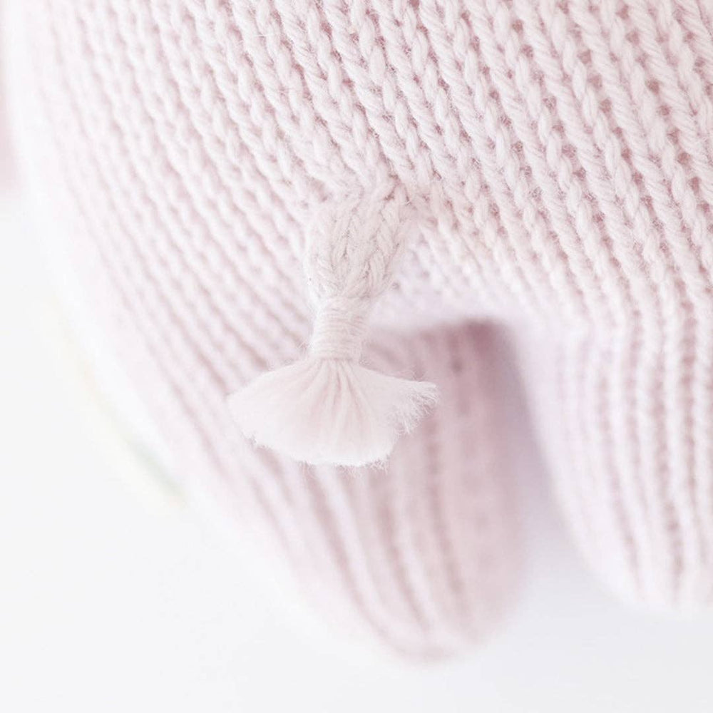 
                      
                        Close-up of baby hippo plush toy’s tail, highlighting hand-stitched detail and heirloom-quality cotton yarn
                      
                    
